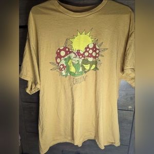 Spencer's yellow/gold mushroom and frog T-shirt, size XL, slightly used